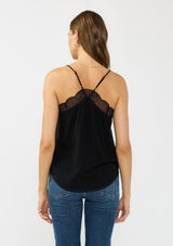 [Color: Black] A back facing image of a brunette model wearing a black lace trimmed camisole with a v neckline and adjustable spaghetti straps. 