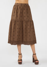 [Color: Brown] A front facing image of a brown embroidered midi skirt. 