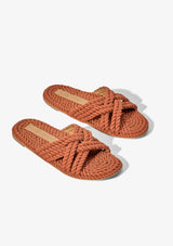 [Color: Terracotta] Handwoven plant based fabric slide on sandals. Vegan, sustainably and ethically made in India.