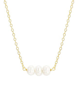 Pearl necklace with gold chain on a white background
