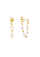 Delicate chain hoop earrings with freshwater pearls. Crafted from fourteen karat gold on sterling silver base, these beachy earrings are hypoallergenic and tarnish resistant. 