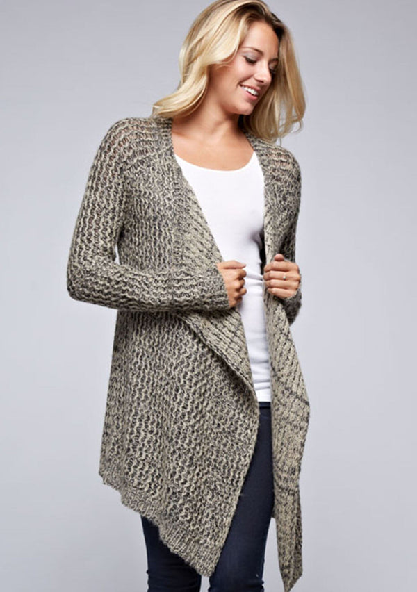 [Color: Black/Natural] A front facing image of a blonde model wearing a marled knit black and beige cardigan with a shawl collar and cozy long sleeves. A casual fall cardigan. 