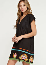 [Color: Black] A colorful embroidered black caftan mini dress with short sleeves and a v neckline.