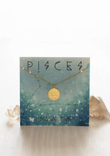 [Zodiac Sign: Pisces] Gold necklace with Pisces zodiac design on a matching card with decorative elements.