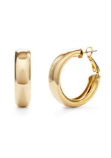 Gold hoop earrings on a white background
