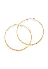 [Color: Gold] A pair of large, thin gold hoop earrings with a hammered texture.