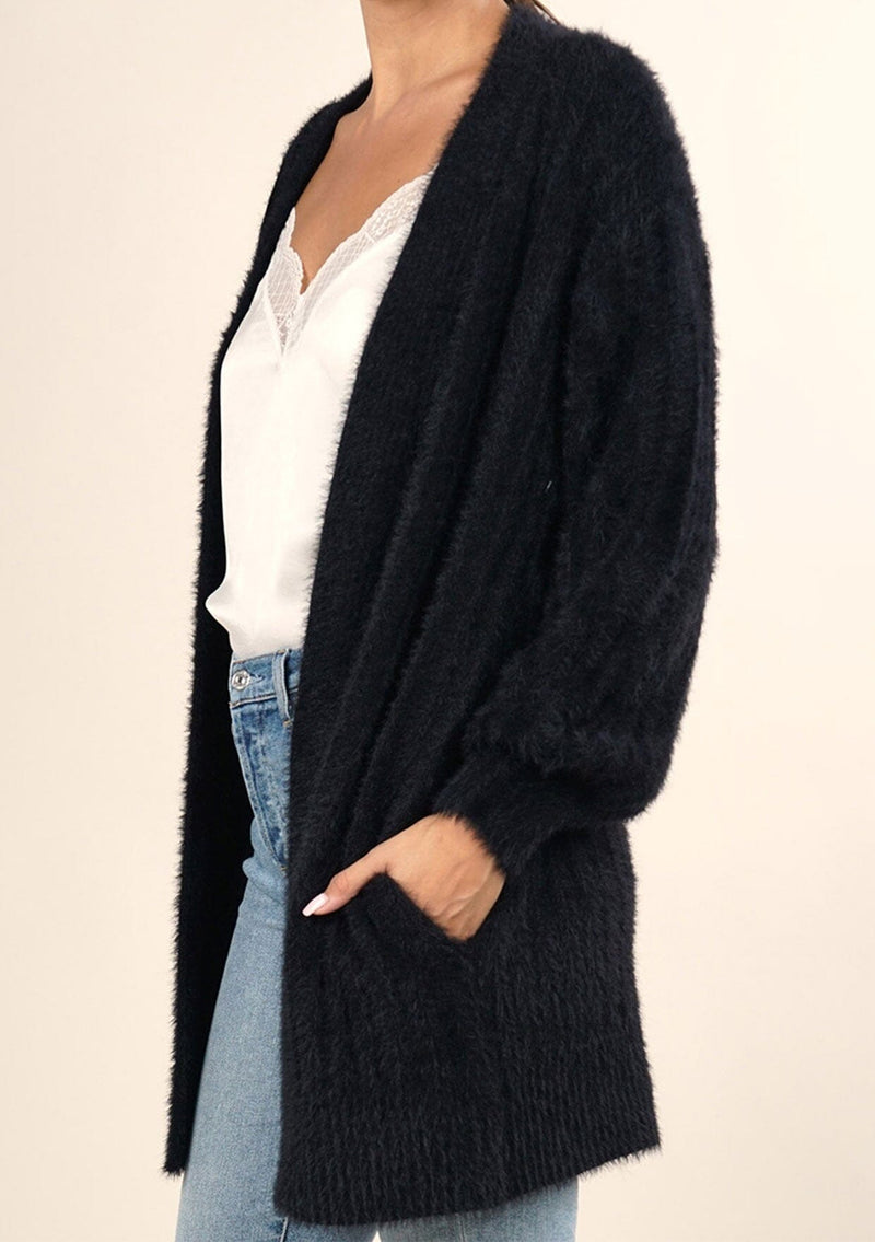 [Color: Black] Soft and super cute fuzzy long cardigan sweater with ribbed details and side pockets.