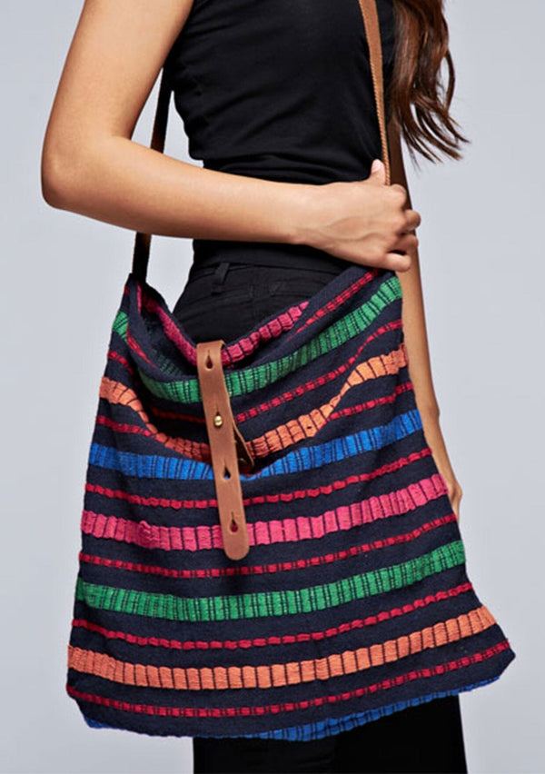 [Color: Black/Multi] A multi colored striped crossbody tote bag. 