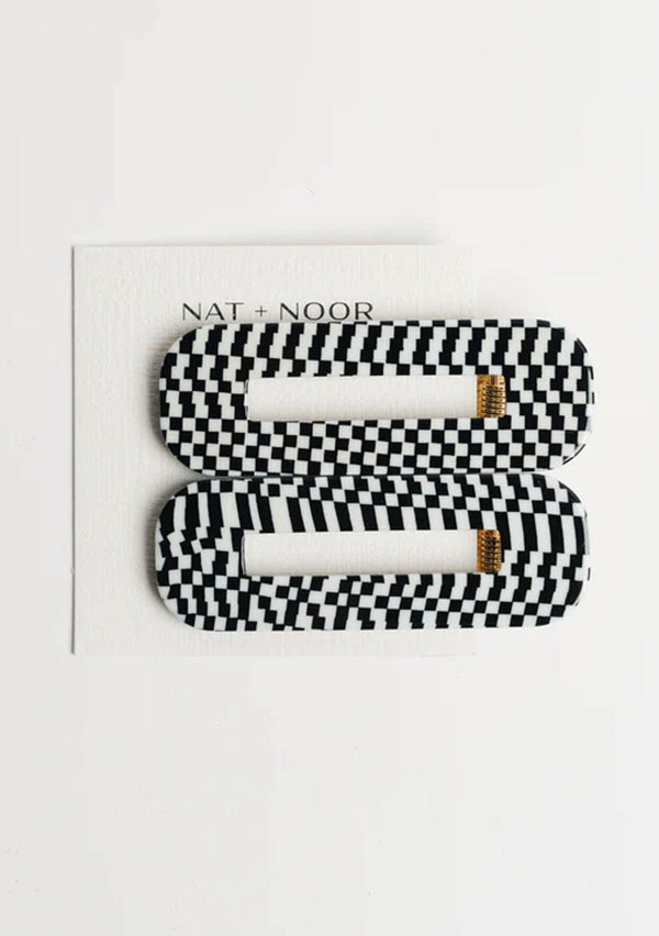 [Color: Black/White] A black and white checkered hair clip set from Nat and Noor. 