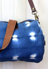[Color: Blue/OffWhite] Blue tie dyed duffel bag. 