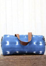 [Color: Blue/OffWhite] Blue tie dyed duffel bag. 