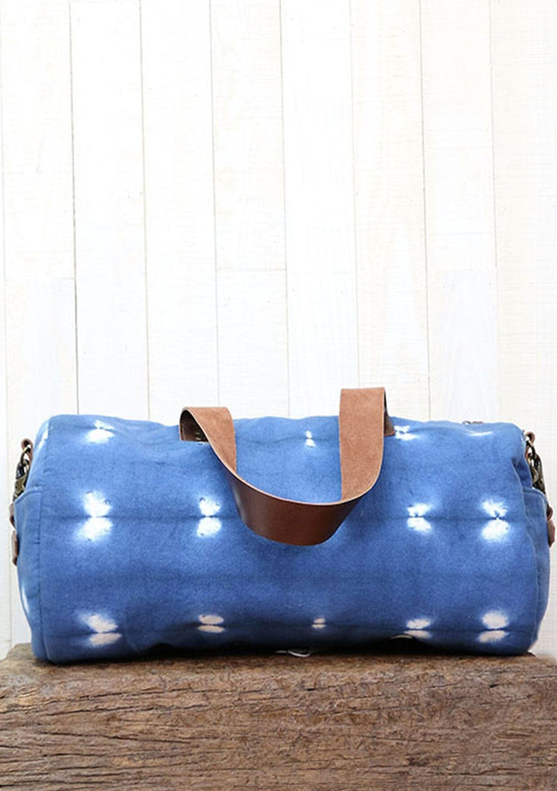 [Color: Blue/OffWhite] Blue tie dyed duffel bag. 