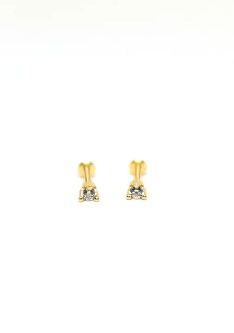 Delicate hypoallergenic stud earrings with a cubic zirconia stone, fourteen karat gold plated on a sterling silver base. Tarnish free, nickel free, and with a comfortable flat base backing. 