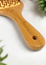 Wooden hairbrush from Bamboo Switch.