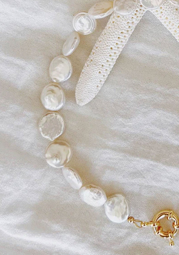 [Color: Pearl] A bohemian beach choker necklace made with flat freshwater pearls. 