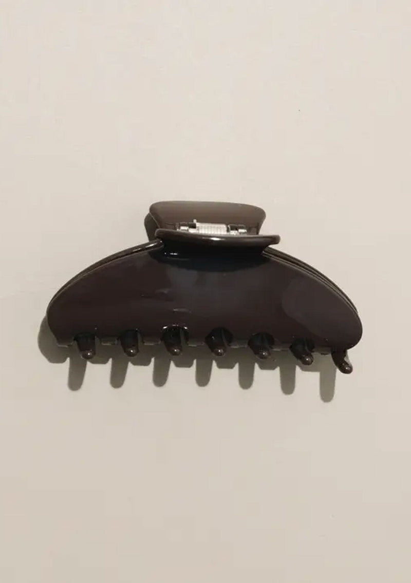 [Color: Chocolate] A chocolate brown medium sized hair clip by Nat and Noor. 