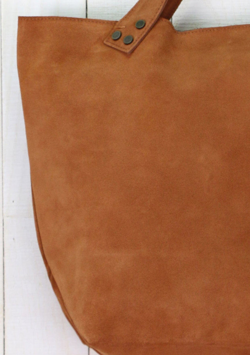 [Color: Cognac] A classic brown suede leather tote bag.