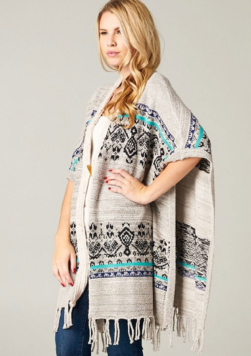 [Color: Cream/Ocean] A bohemian fringed poncho sweater