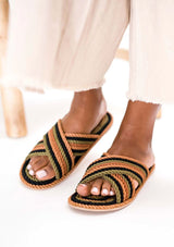 [Color: Earth Tone Multi] A hand dyed woven rope slide sandal with crossover top straps. Sustainably made in small batches. 
