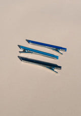 [Color: Blue] Set of 3 alligator style hair clips in navy, sky blue, and royal blue.