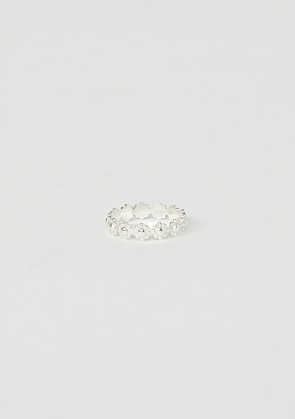 [Color: Silver Daisy] A daisy stacking ring hand made from sterling silver.