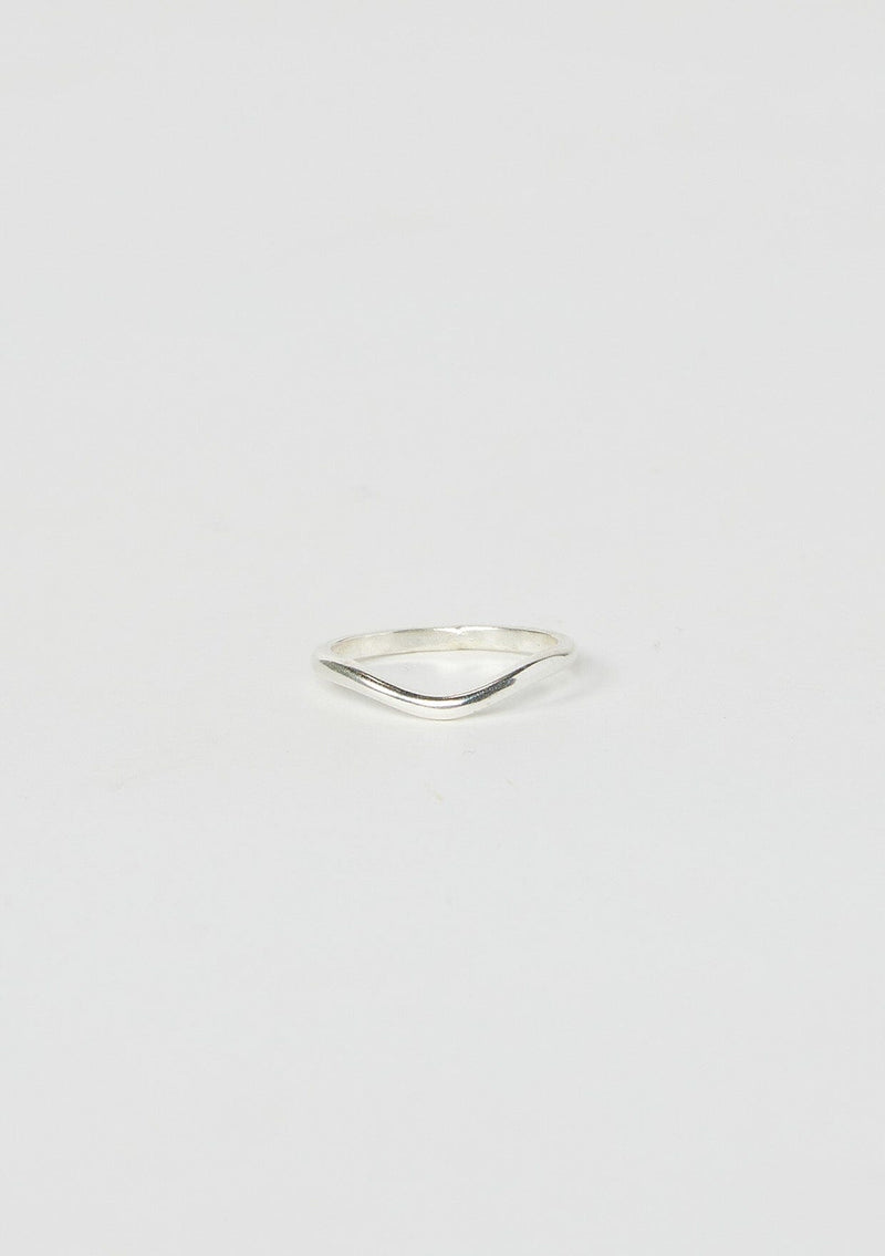 [Color: Silver Arched] An arched stacking ring hand made from sterling silver.
