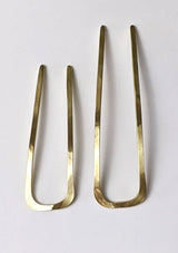 [Color: Brass] A timeless French hairpin handcrafted from heavy recycled brass.
