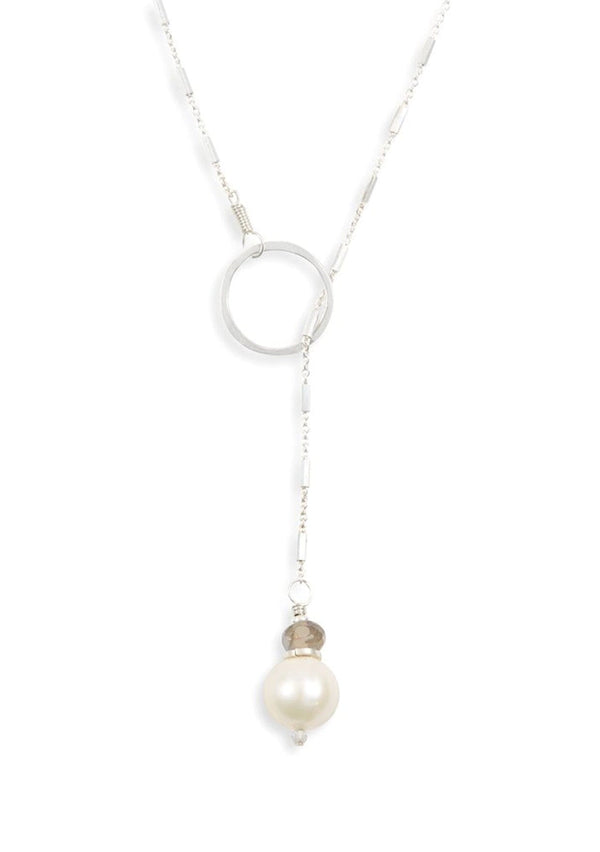 Sterling silver lariat necklace with a freshwater pearl  and circle pendant. An elegant y necklace for v-necklines. 