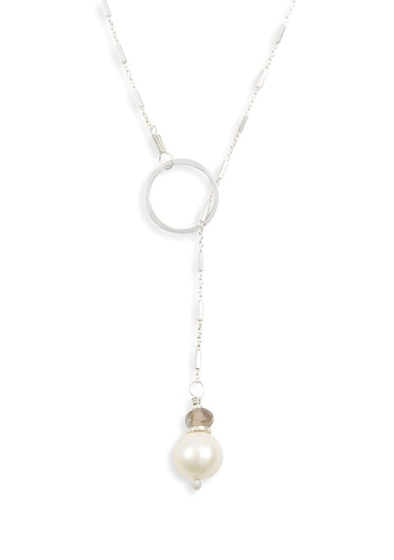 Sterling silver lariat necklace with a freshwater pearl  and circle pendant. An elegant y necklace for v-necklines. 