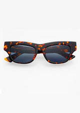 [Color: Tortoise] Sleek cat-eye sunglasses with a tortoise frame. 