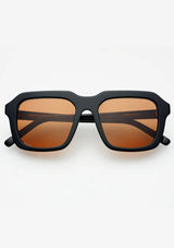 [Color: Black] Sunglasses with black frame and amber lenses on a white background