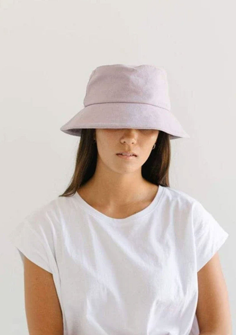 [Color: Lavender] A nineties style cotton bucket hat by Gigi Pip. Fully packable and adjustable. 