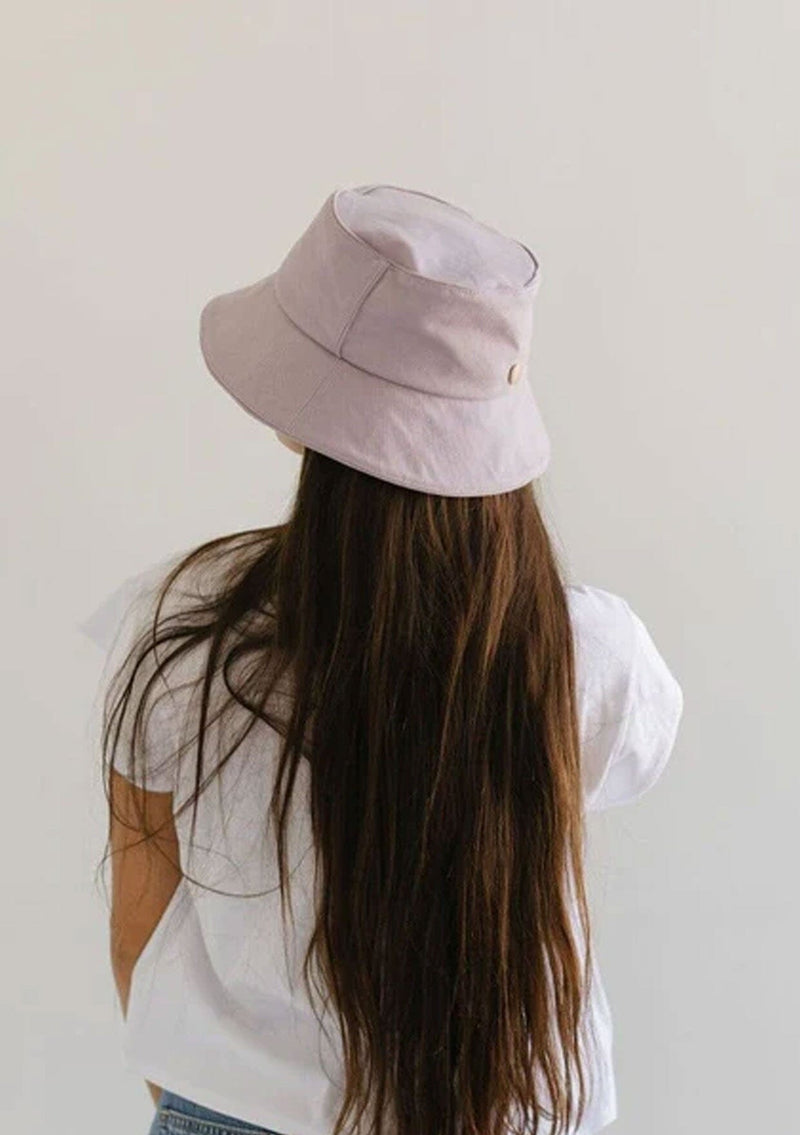 [Color: Lavender] A nineties style cotton bucket hat by Gigi Pip. Fully packable and adjustable. 