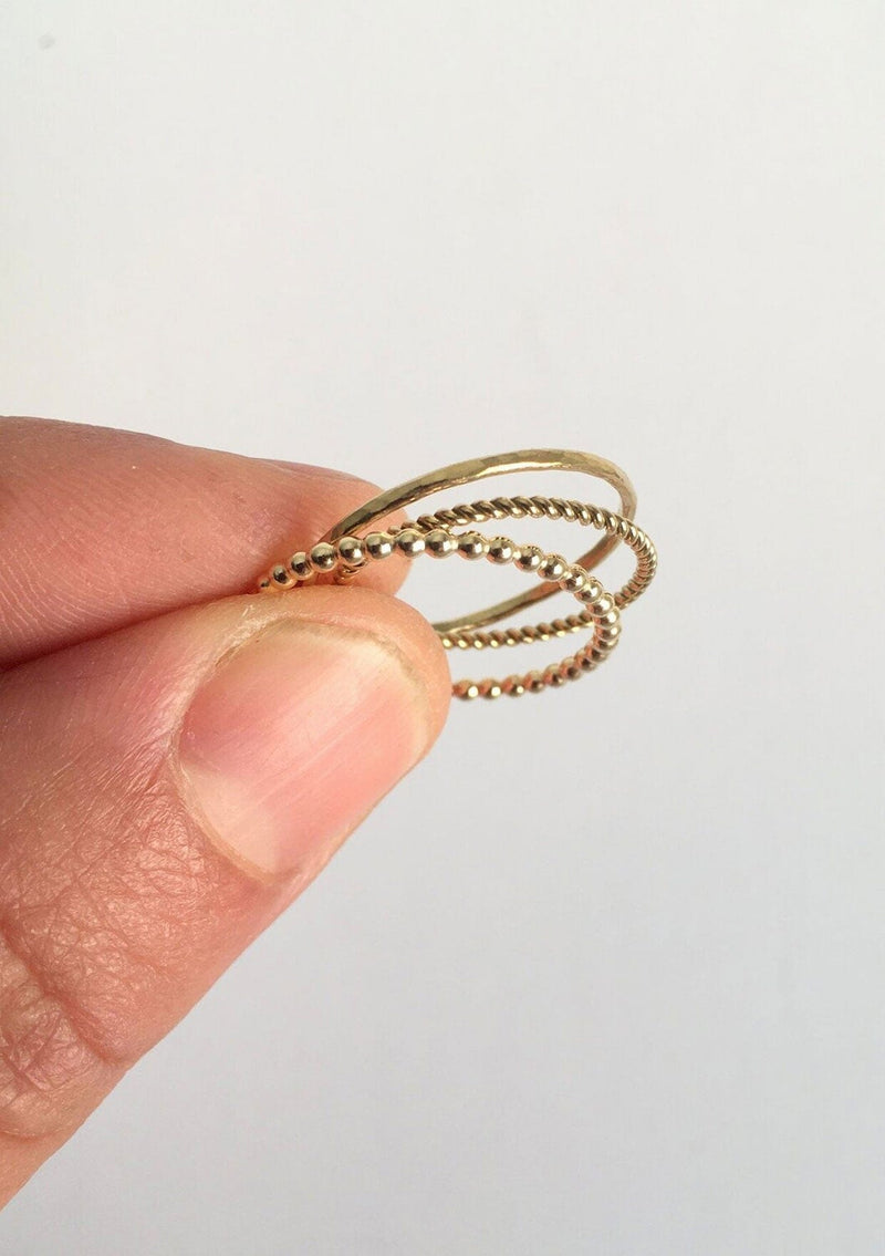 [Color: Gold Fill] A thin hammered gold fill ring by Moon Pi jewelry. 