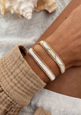 [Color: White] A bohemian bracelet made with glass seed beads. Fully adjustable bracelet, perfect for stacking. 