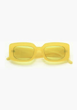 [Color: Pineapple] A pair of rectangle, yellow frames with transition day to night lenses. Made by INDY