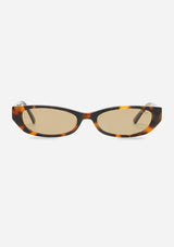 [Color: Tortoise] A pair of slim shaped brown tortoise acetate frames with tan tinted lenses. Made by INDY