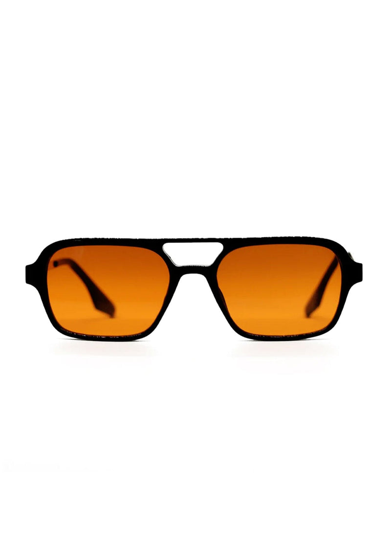 [Color: Orange] INDY sunglasses with a classic aviator frame and amber orange lenses.