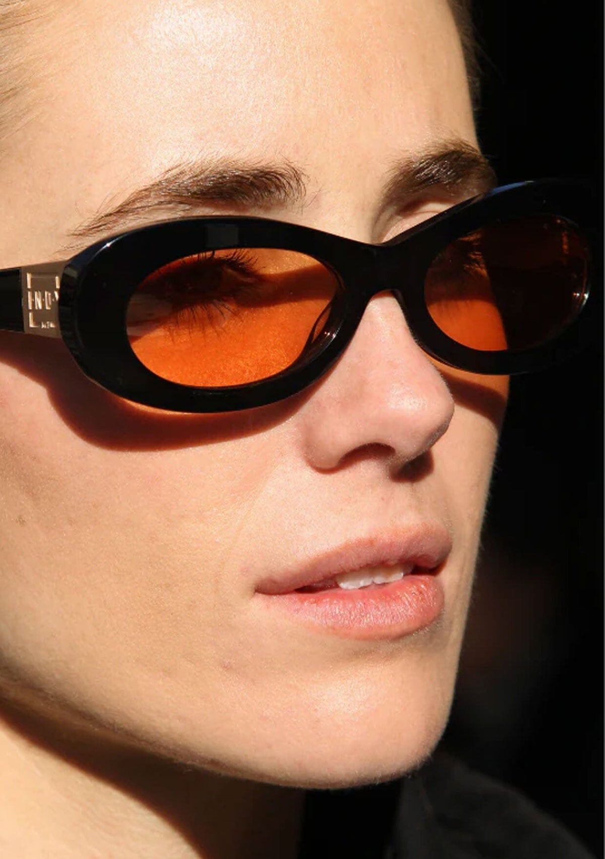 INDY SoHo Oval Sunglasses in Black Affordable Round Sunglasses with Orange Lenses main image 4
