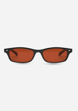 [Color: Black] A pair of slim, rectangle black acetate frames with amber lenses. Made by INDY