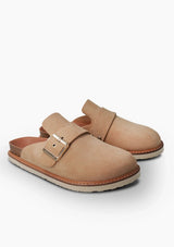 [Color: Almond] Tan velour clogs with cork and foam sole and gold buckle strap.