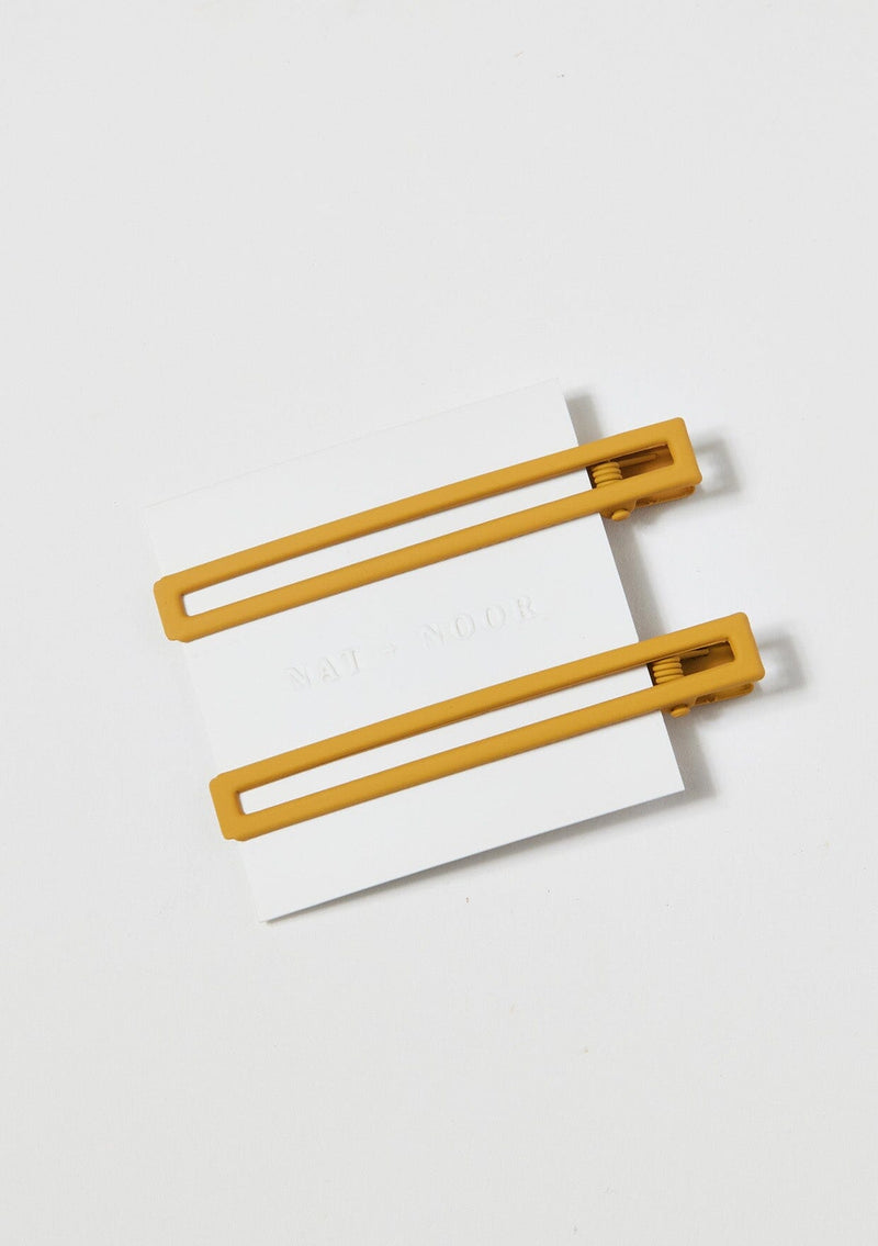 [Color: Mustard] A yellow long alligator style metal hair clip.