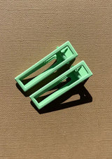 [Color: Minty] A light green alligator hair clip. Comes in a set of two.