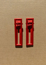 [Color: Heirloom Tomato] A bright red alligator hair clip. Comes in a set of two.