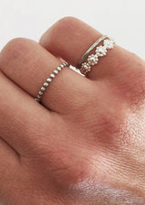 [Color: Silver] A thin hammered stacking ring hand made from sterling silver.