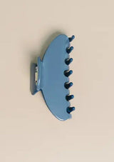 [Color: Blue Sea] A two tone blue medium sized hair clip by Nat and Noor. 