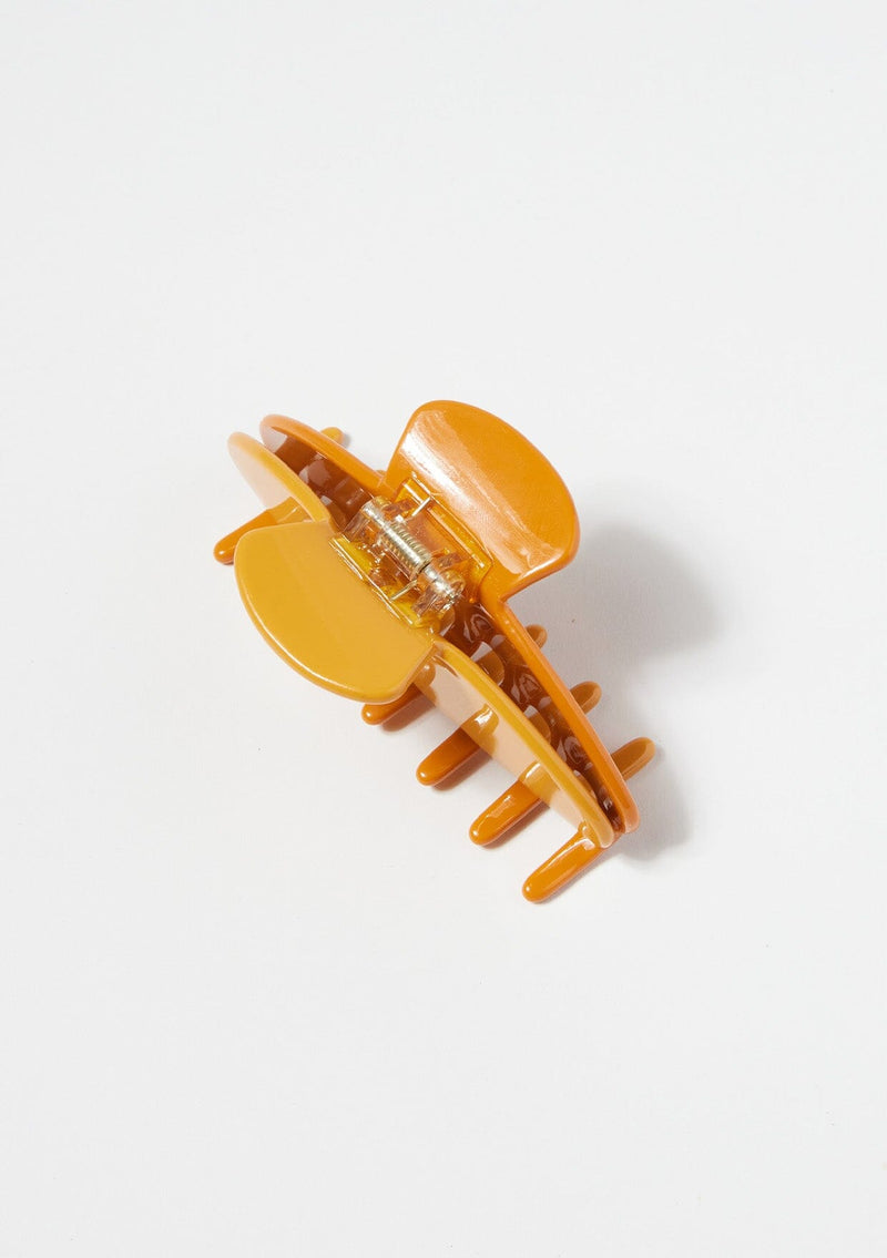 [Color: Citrus] A two tone yellow and orange medium sized hair clip by Nat and Noor.