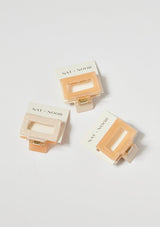 [Color: Peach/Beige] A peach and ivory two tone hair claw clip made with sustainable cellulose acetate.
