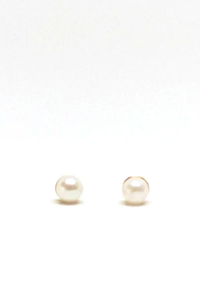 Classic pearl stud earrings, hypoallergenic and made in the USA. 