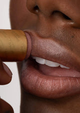 [Color: Beverly] A buildable lip tint made from 100% natural ingredients. An eco-friendly beauty product handmade from Poppy & Pout. 